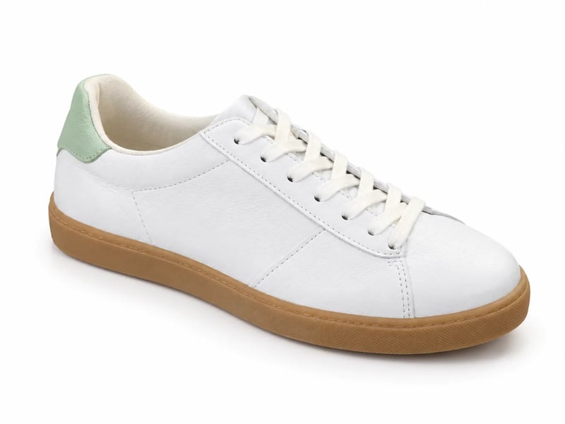 The same sneaker on a pure white seamless backdrop with soft, even studio light